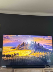 Modern Large-Screen Television with Soundbar