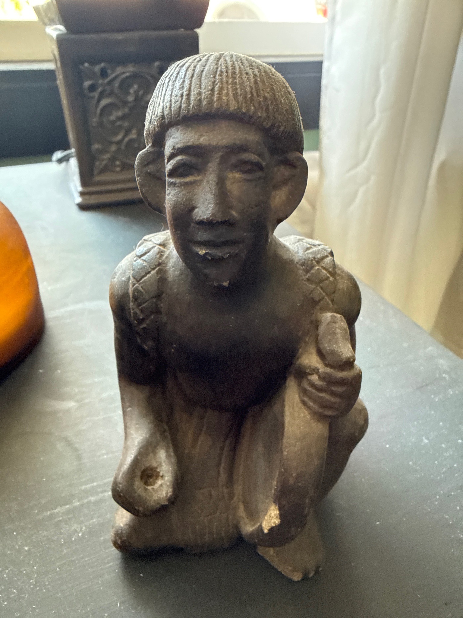 Submitted photo of Carved stone figural sculpture