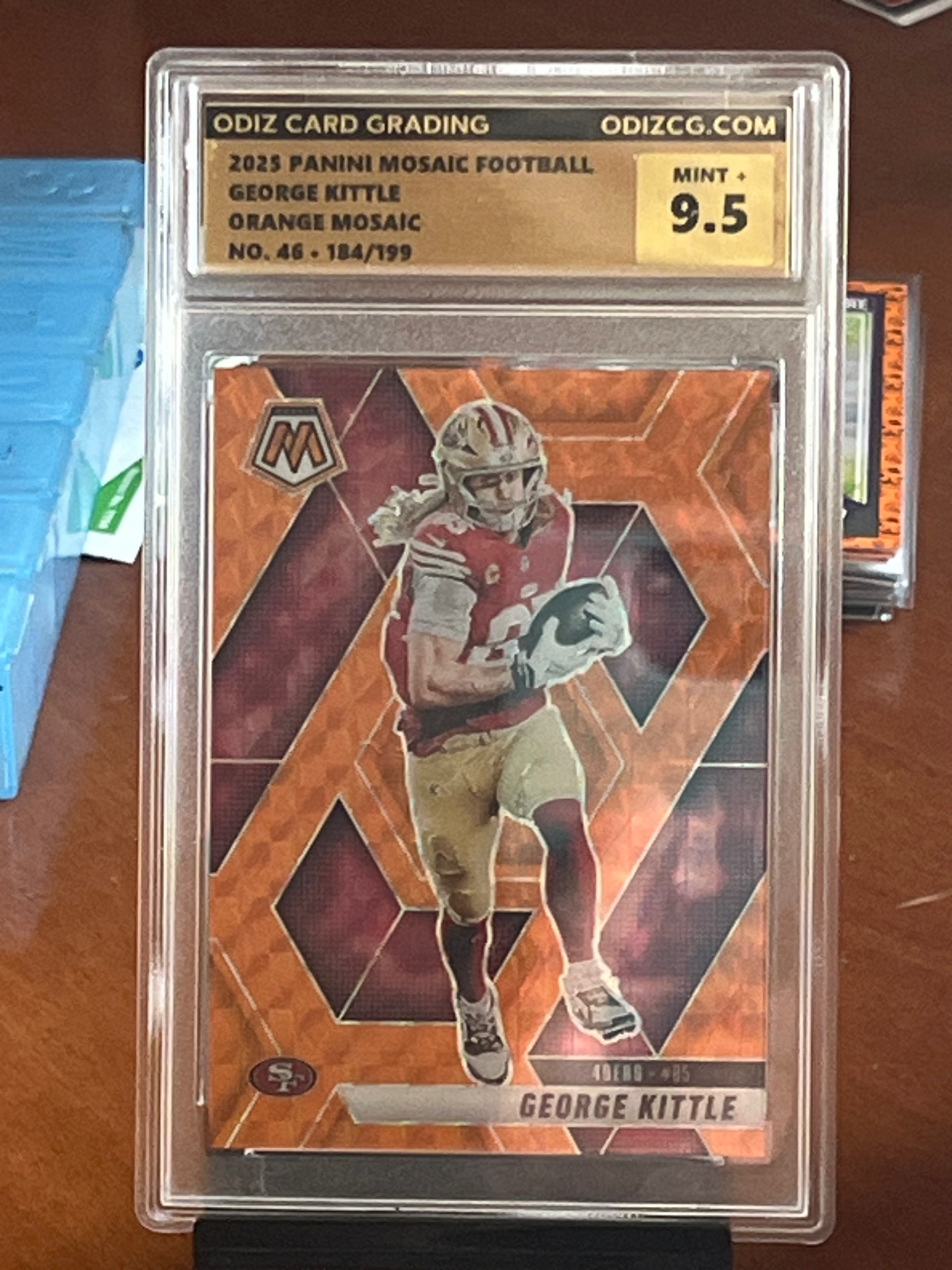 2023 Panini Mosaic George Kittle Orange Mosaic Parallel #46 (184/199) - Odiz Graded 9.5 Mint+