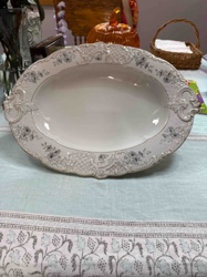 Oval Porcelain Serving Platter with Floral and Rococo-Inspired Relief Decor