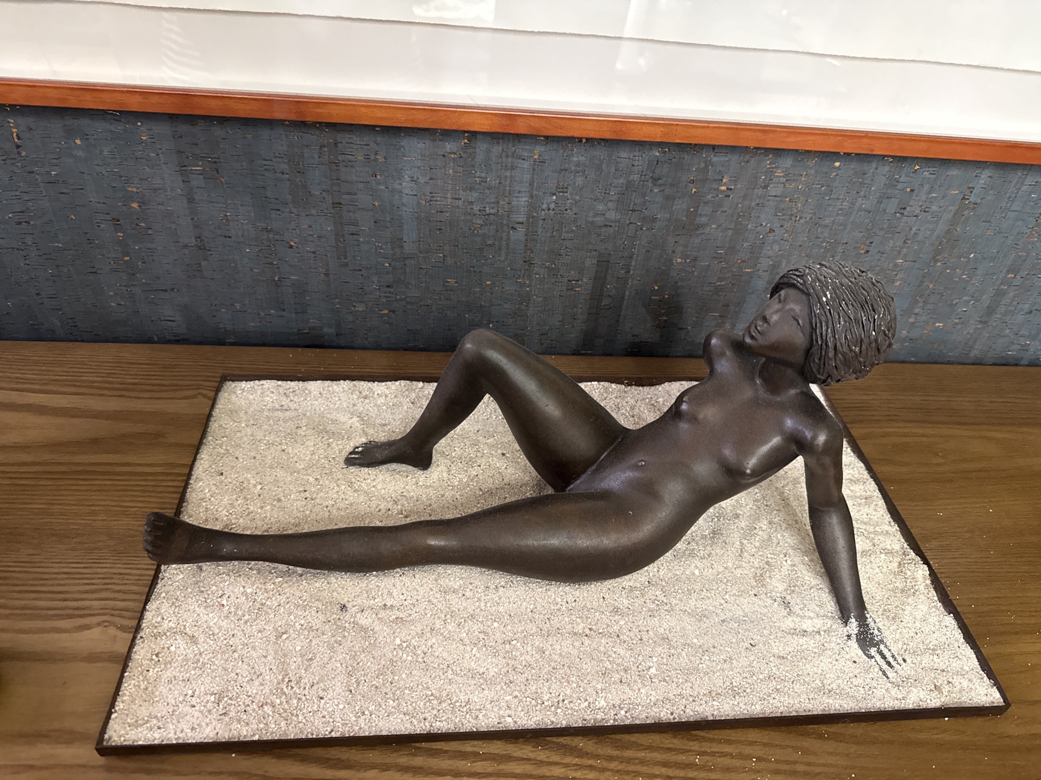 Submitted photo of Figural bronze sculpture of a reclining female nude