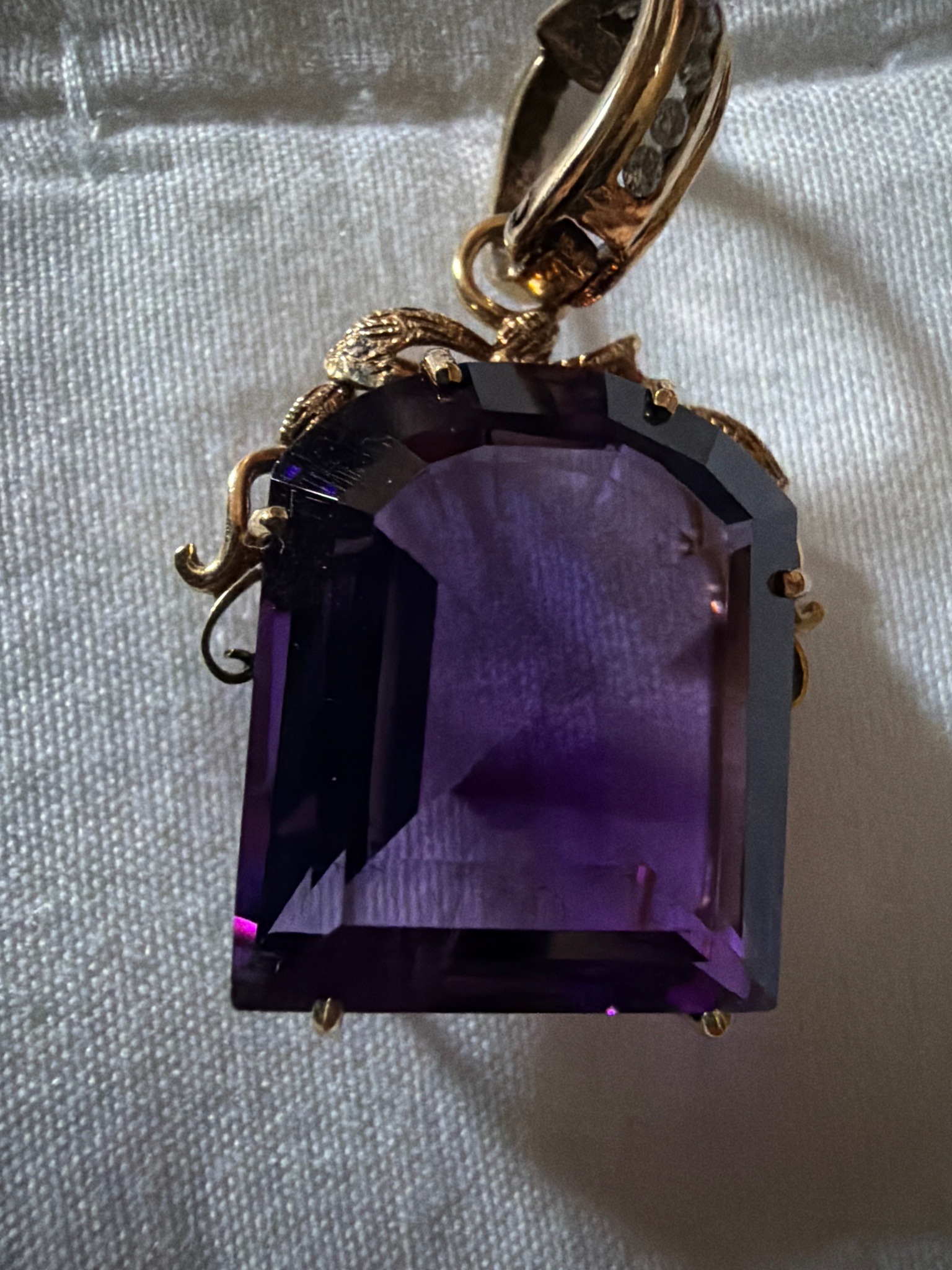 Submitted photo of Pendant with purple gemstone in the Victorian style