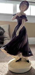Porcelain Figurine of a Lady in a Purple Gown