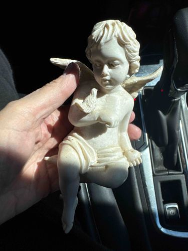 Cherub Child Figurine with Bird