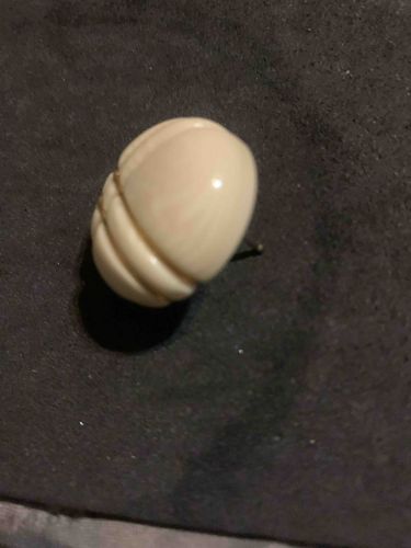 Vintage Carved Bone or Early Plastic Scalloped Earring