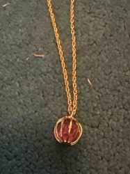 Gold-Tone Chain Necklace with Faceted Red Gemstone Cage Pendant