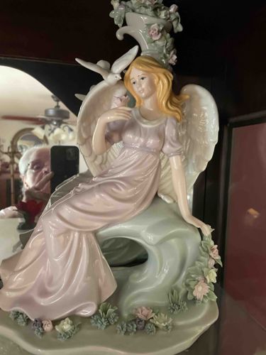 Porcelain Angel Figurine with Doves and Floral Accents