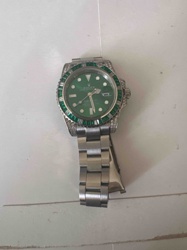 Rolex Watch with Emeralds and Diamonds