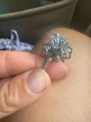 Ornate Silver-Toned Ring with Blue Gemstones
