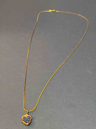 Gold-Toned Necklace with Irregular Blue Stone Pendant