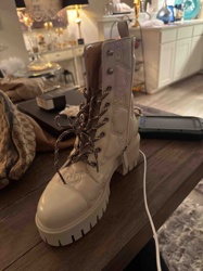 Gucci GG Embossed Leather Ankle Combat Boots