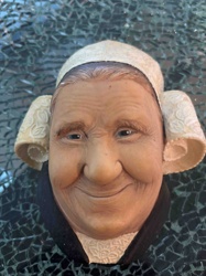 Wall Decoration of Elderly Woman's Face