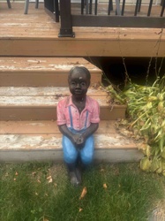 Painted Cast Concrete Garden Figurine of a Seated Boy