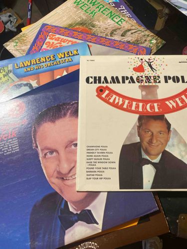 Collection of Lawrence Welk Vinyl Records, including 'Champagne Polka'