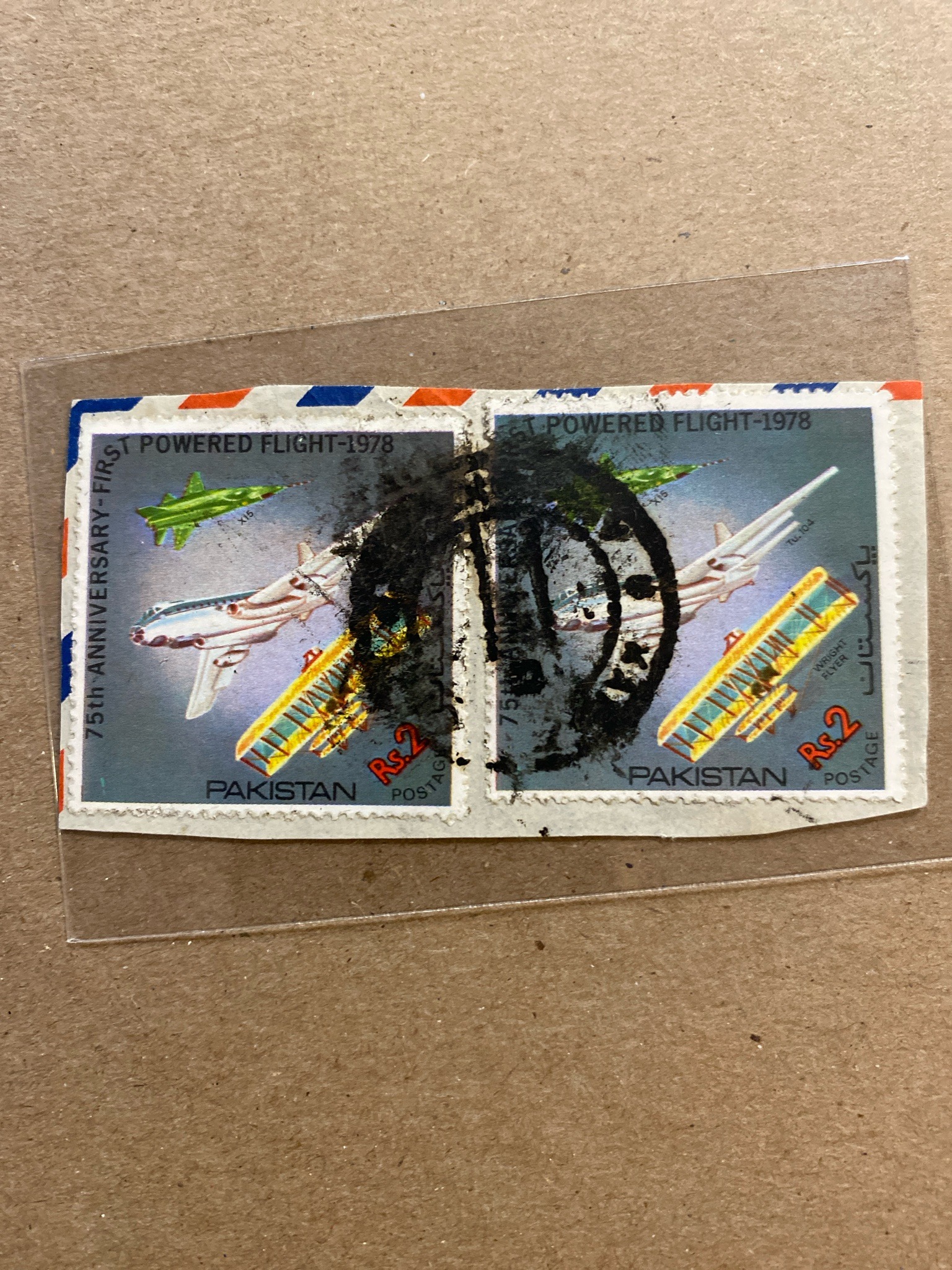 Submitted photo of Pakistani Postage Stamp Pair Commemorating 75th Anniversary First Powered Flight-1978