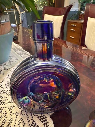 Iridescent Cobalt Blue Glass Commemorative Bottle with Embossed Portrait