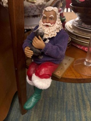 Shelf-Sitting Santa Claus Figurine with Kitten