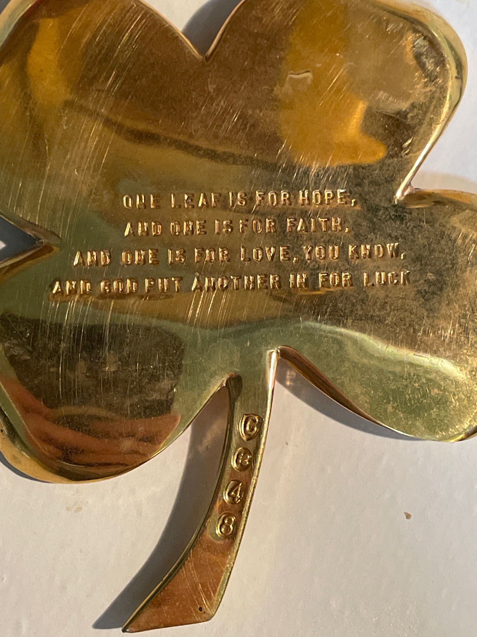 Submitted photo of Brass shamrock dish, attributed to Taunton Silversmiths (not authenticated)