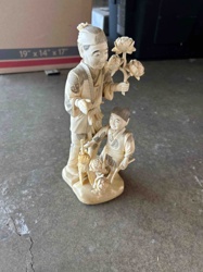 Carved Bone/Ivory Figurine of Two Traditional Asian Figures with Flowers