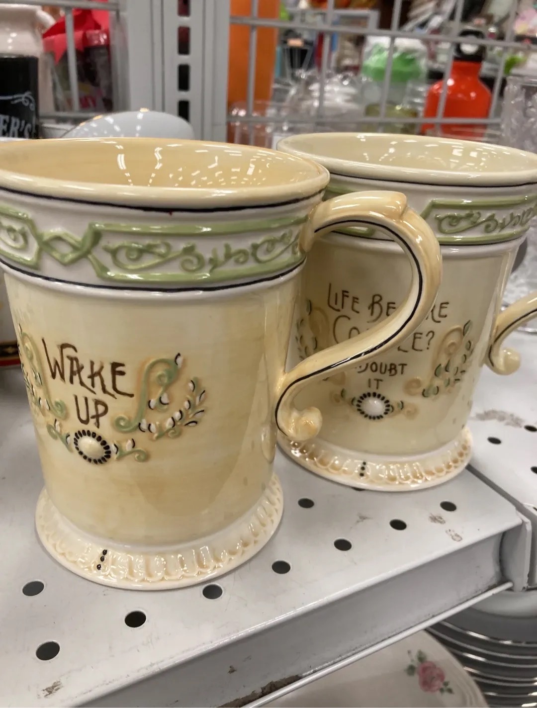 Submitted photo of Ceramic coffee mugs with raised lettering