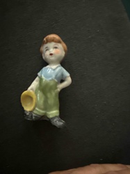 Porcelain Figurine of a Boy with a Bucket