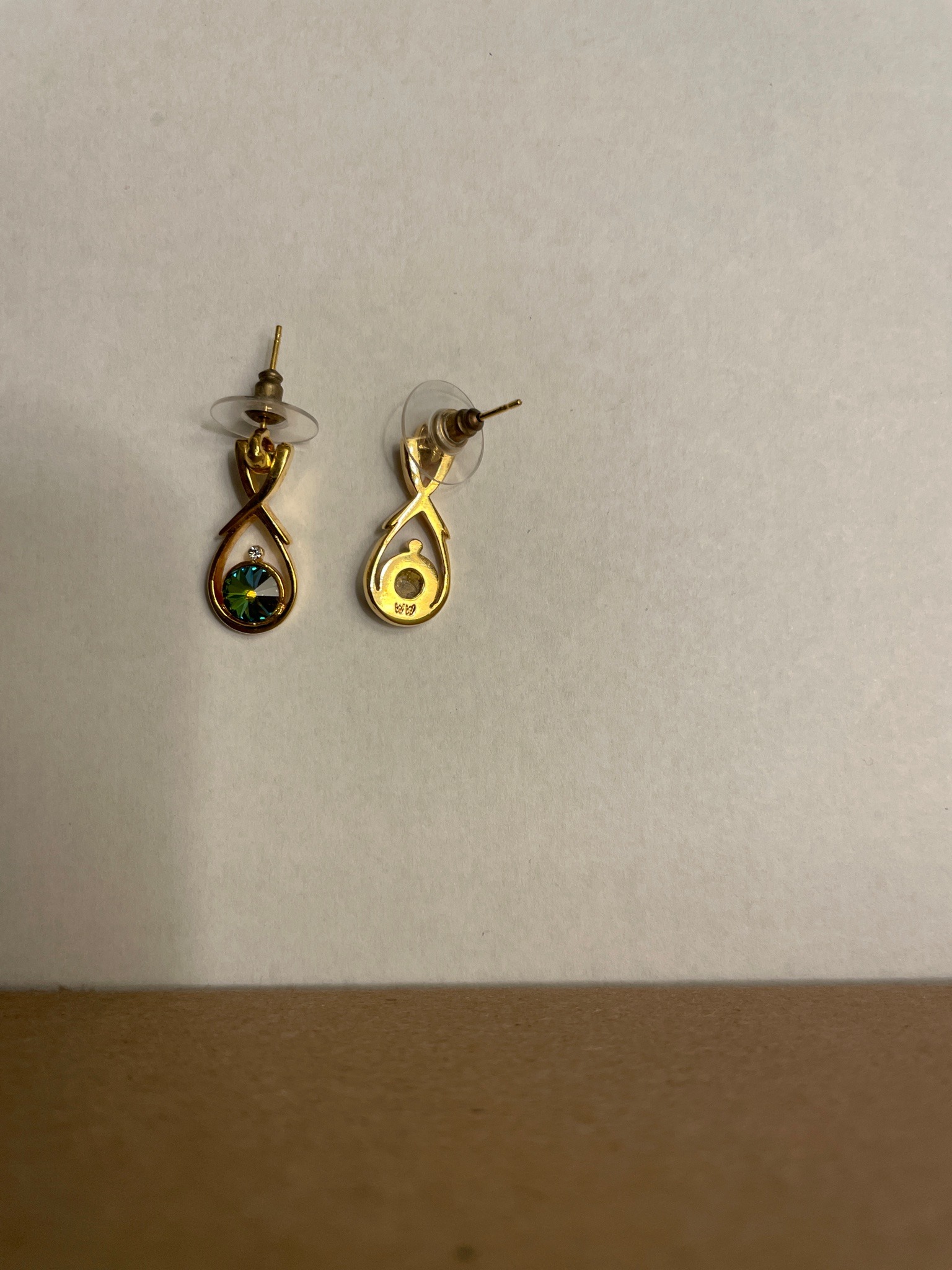Submitted photo of Gold-tone drop earrings with green crystals (not authenticated)