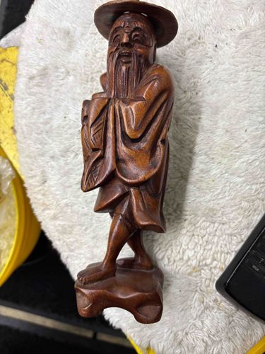 Carved Wooden Figure of a Bearded Man