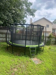 Outdoor Round Trampoline with Safety Enclosure and Ladder