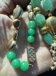 Multi-Strand Green Gemstone and Gold-Tone Beaded Necklace with Decorative Clasp
