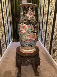 Large Chinese Famille Noire Baluster Vase with Foo Dog Handles on a Carved Wood Stand