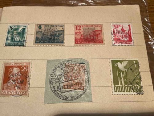Post-war German Stamps Collection on Album Page