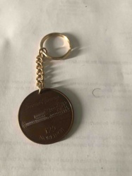 Commemorative Keychain with "Grand Opening 125 Norridge" Building Medallion
