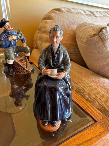 Elderly Woman with Teacup Figurine