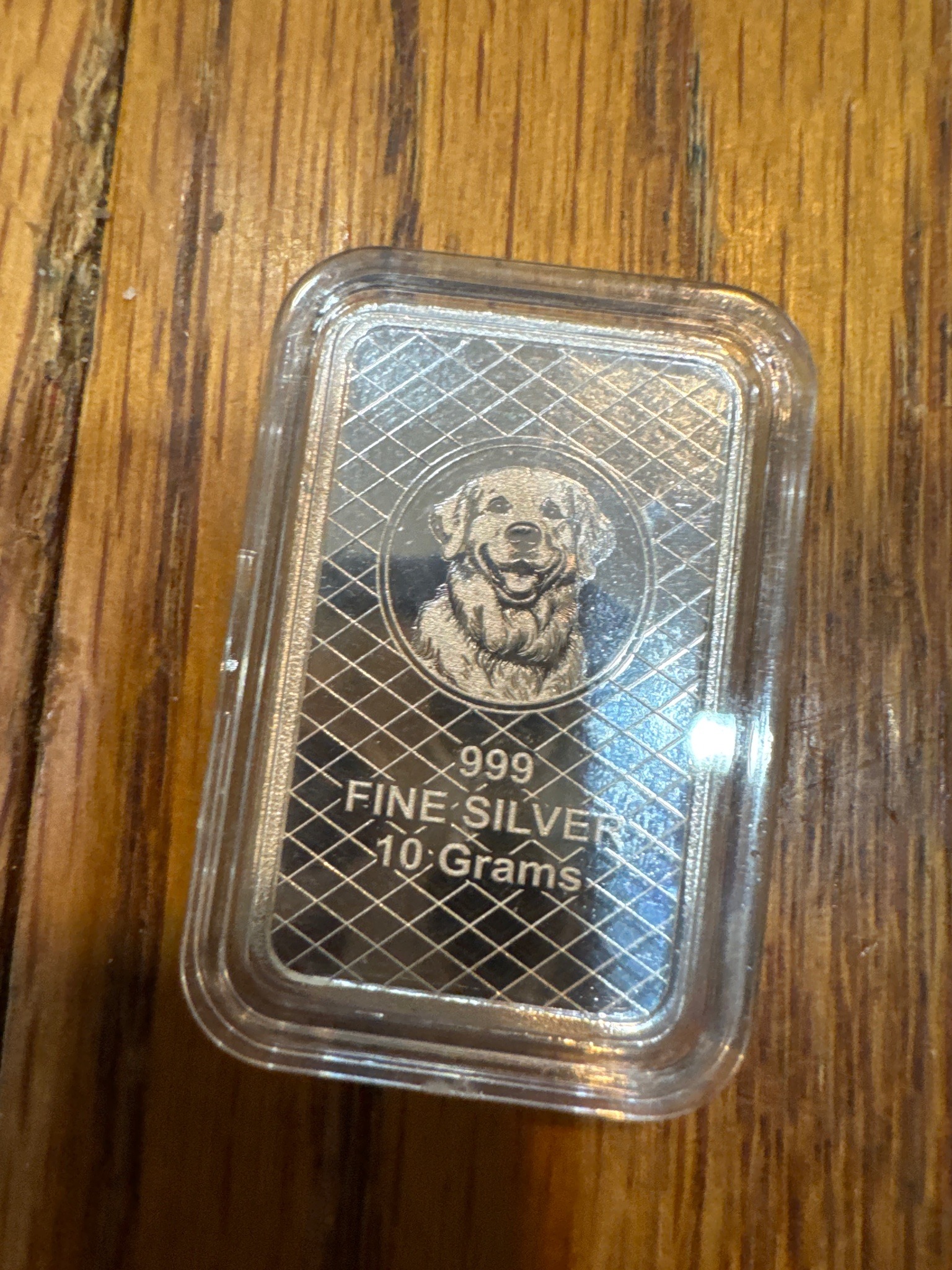 Submitted photo of 10 Gram Fine Silver Bar featuring a Golden Retriever