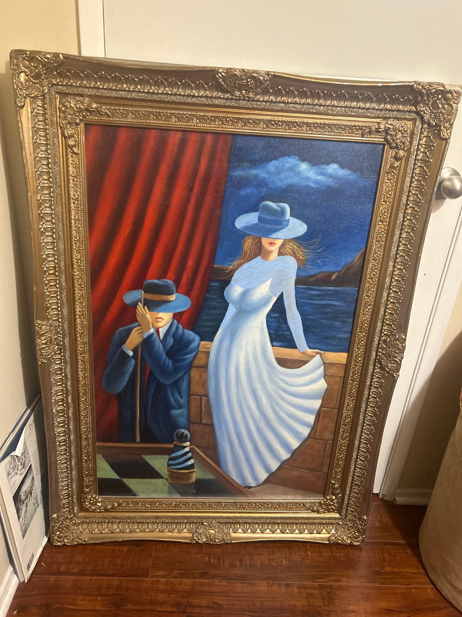 Submitted photo of Oil painting depicting a seated man and standing woman by a seaside balcony