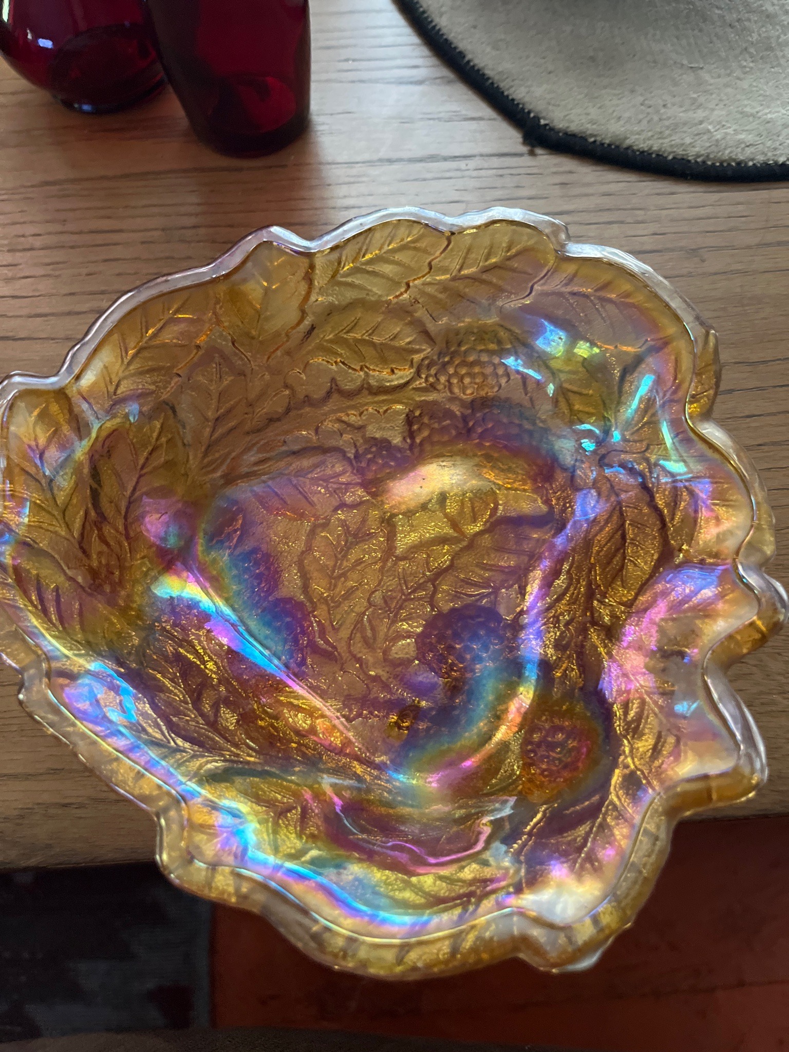 Submitted photo of Carnival glass bowl, appears to be Imperial Glass Grape and Cable pattern (not authenticated)