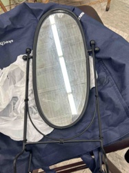 Black Metal Oval Vanity Mirror on Stand