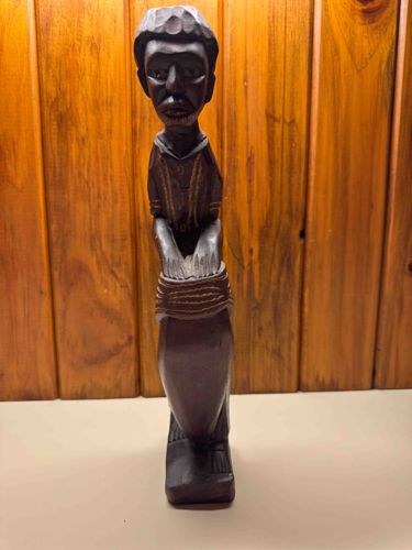 African Figural Carving of a Man with Drums