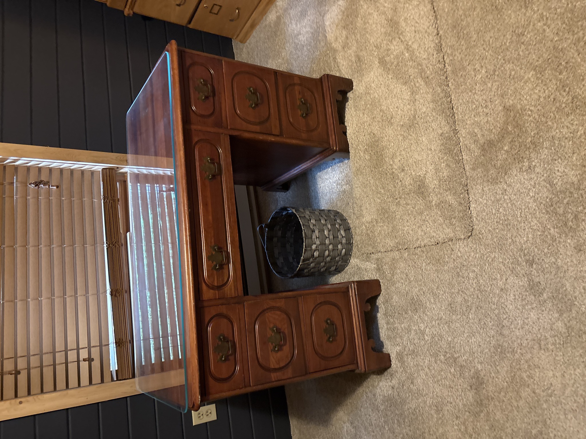 Submitted photo of Wooden double pedestal desk with glass top