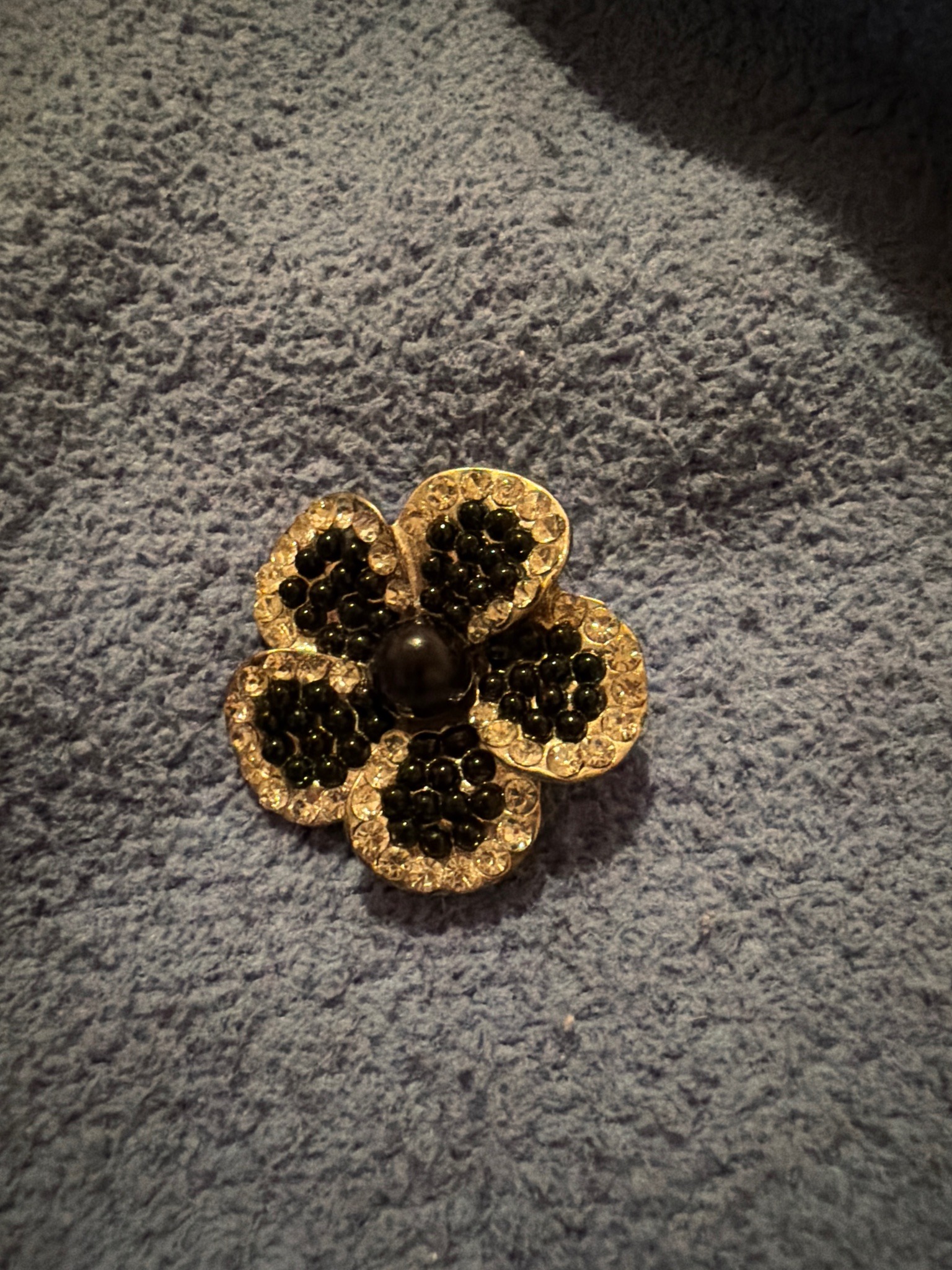 Submitted photo of Floral rhinestone and bead brooch