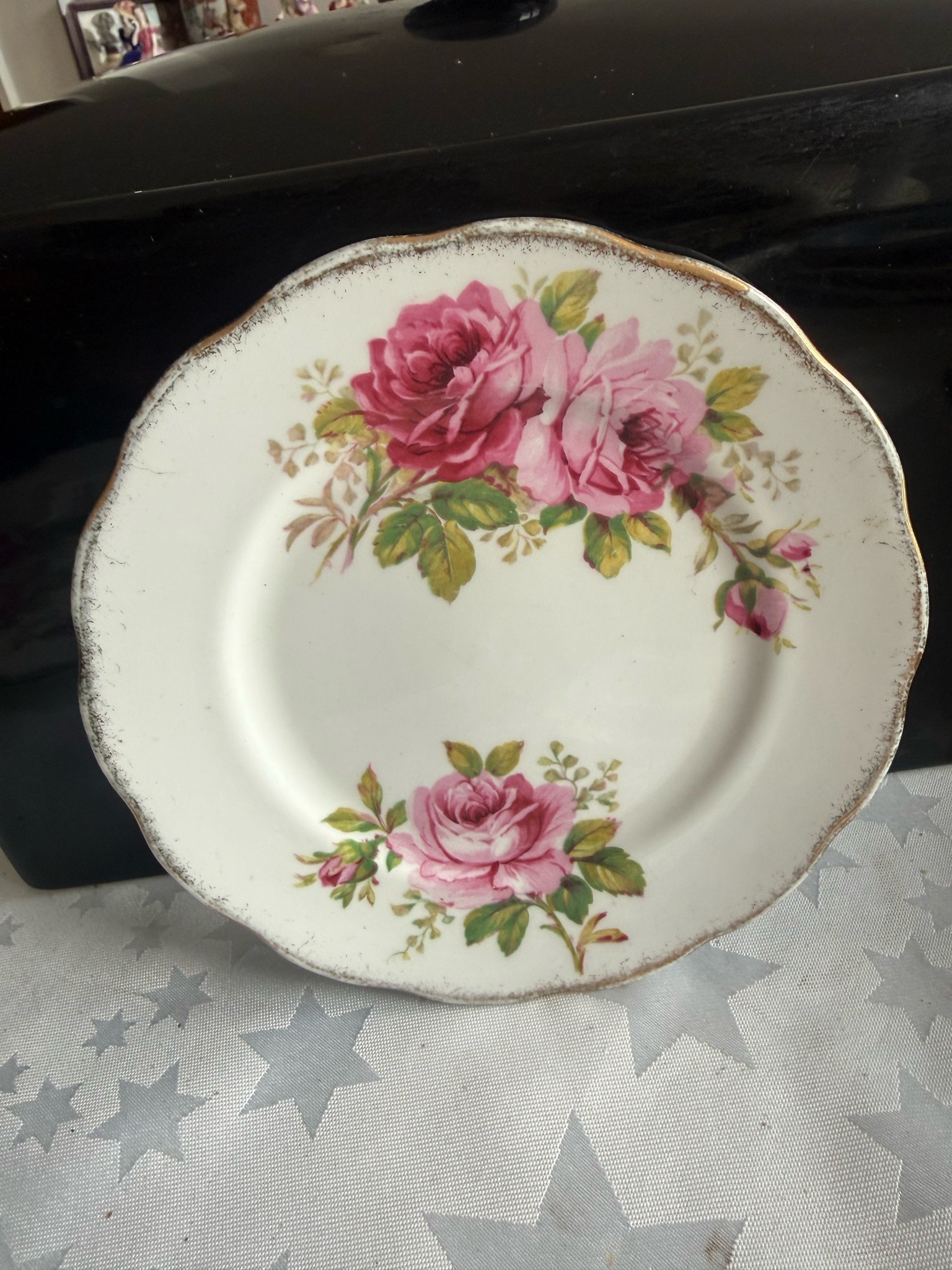 Submitted photo of Scalloped porcelain side plate with pink rose decals
