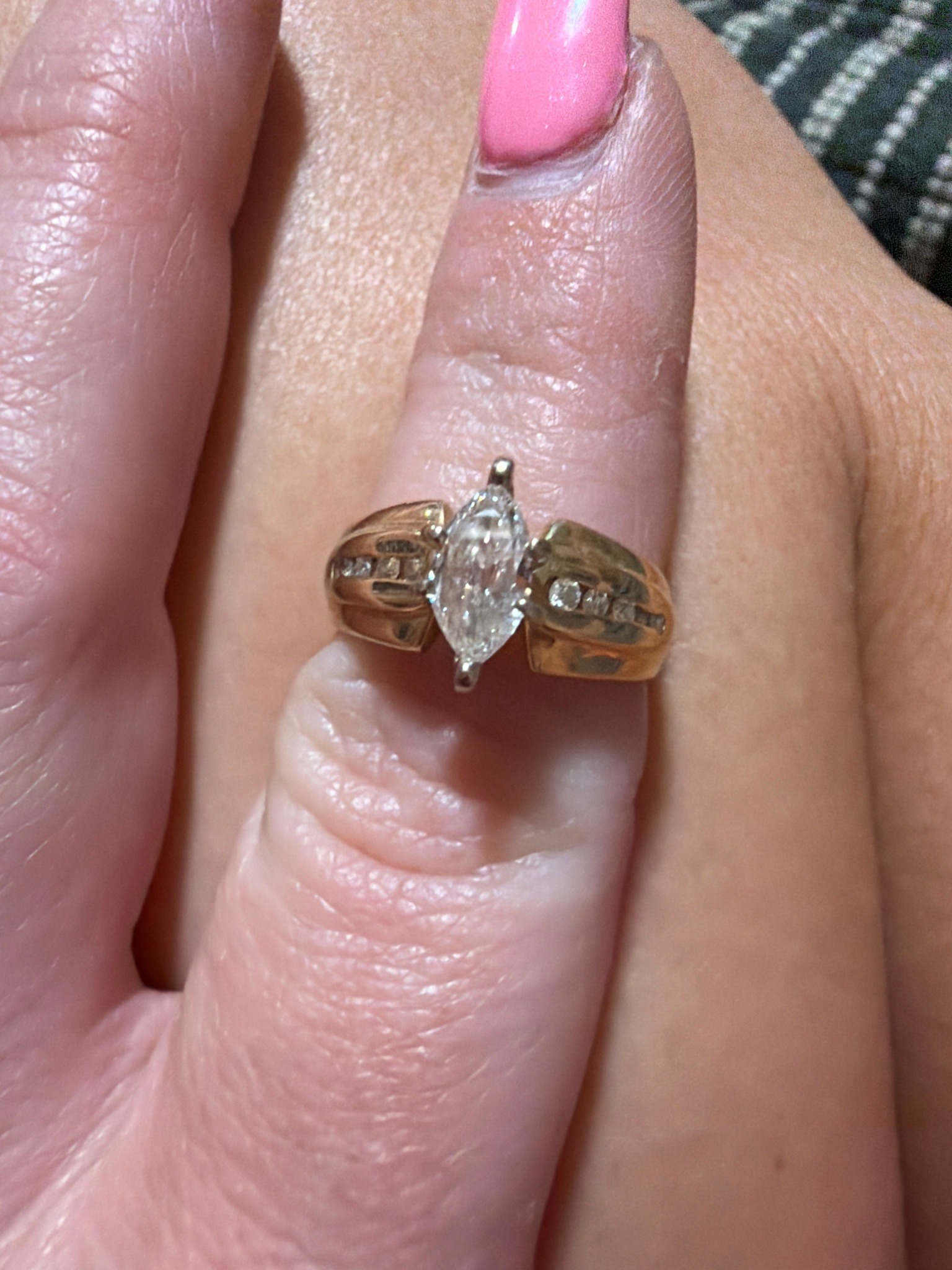 Submitted photo of Diamond engagement ring with marquise-cut center stone