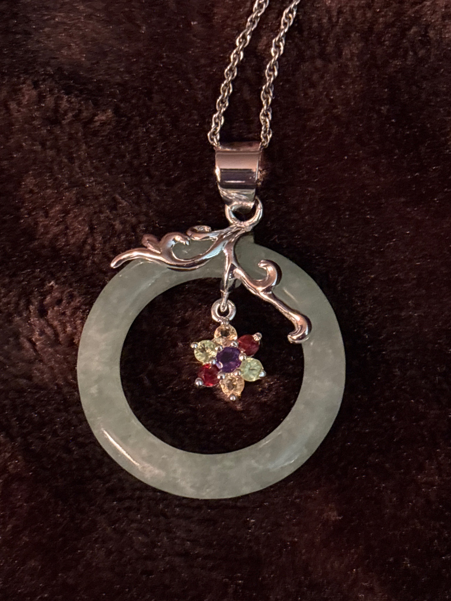 Submitted photo of Jadeite bi disc pendant necklace with gemstone flower cluster (not authenticated)