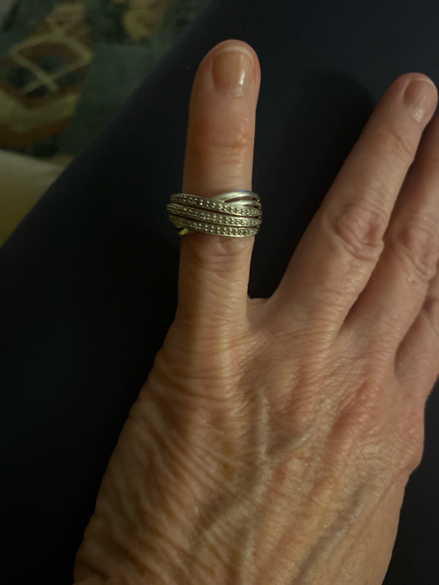 Submitted photo of Multi-strand crossover ring with pavé stones (unverified)