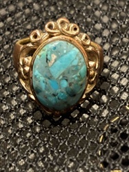 Vintage Gold-Toned Ring with Oval Turquoise Cabochon and Ornate Filigree