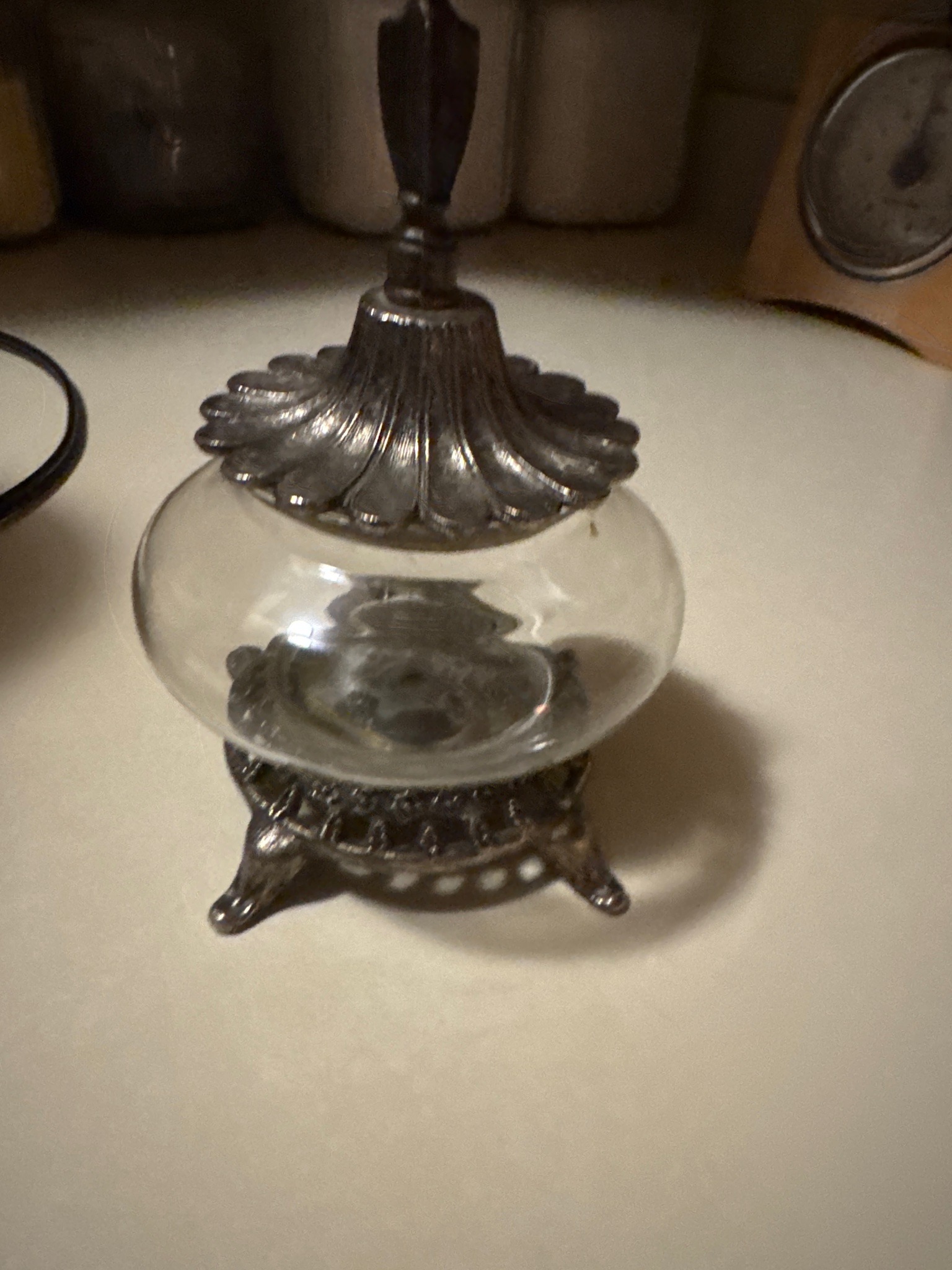Submitted photo of Silver-plated and glass vanity jar