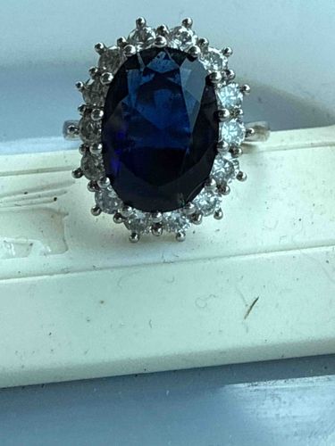 Oval Blue Gemstone Halo Ring