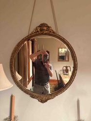 Giltwood Oval Wall Mirror with Decorative Crest