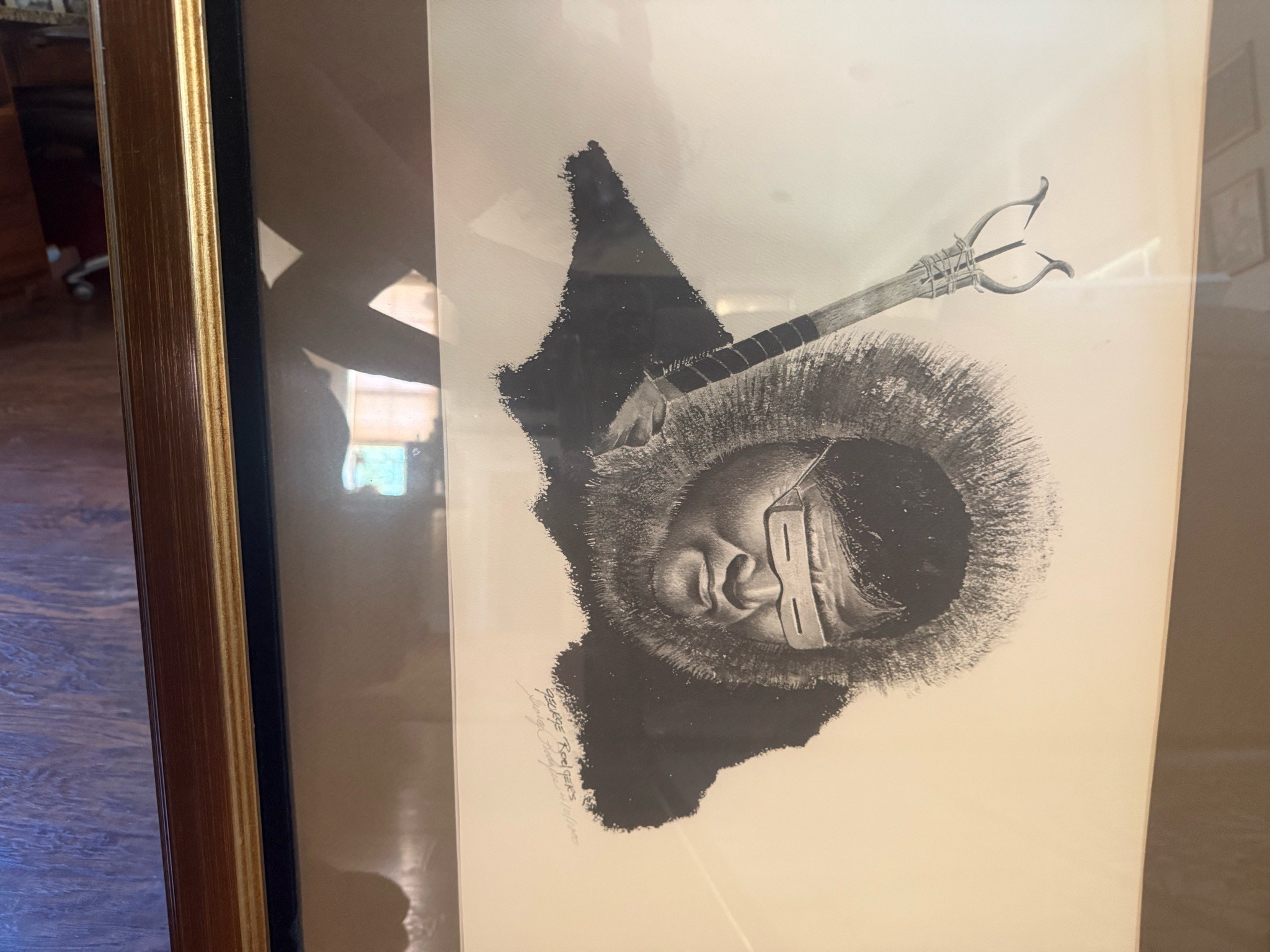 Submitted photo of Black and white portrait print signed 'George Rodgers'