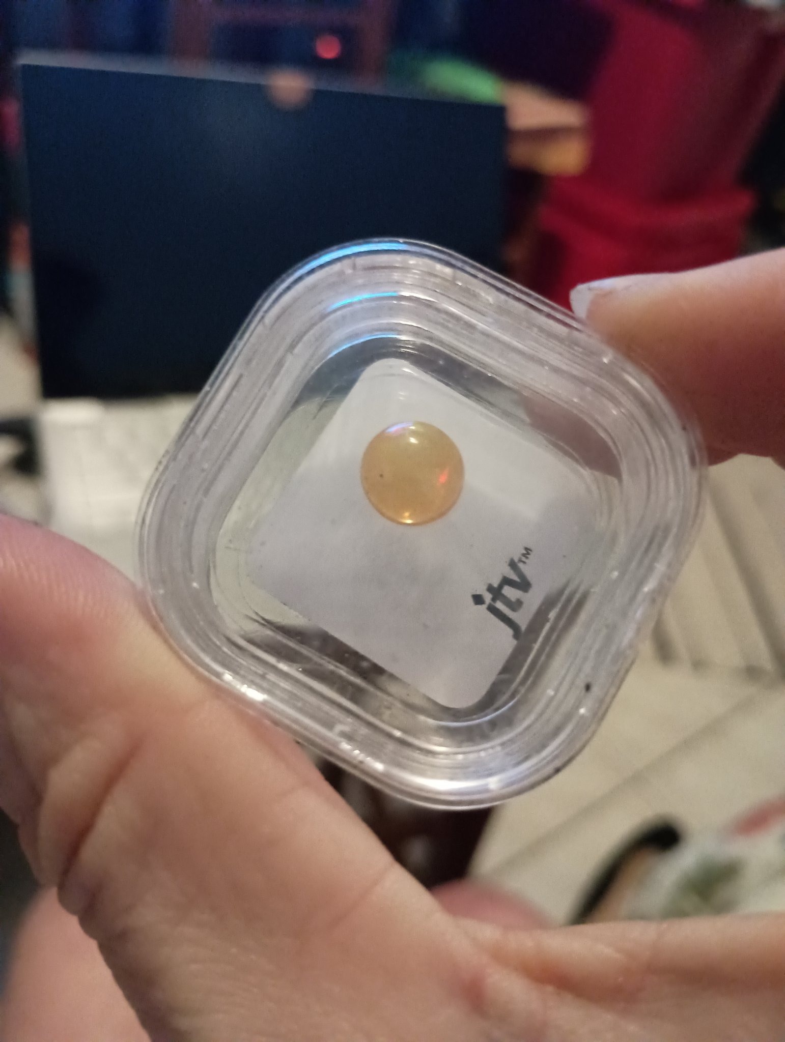 Submitted photo of Round cut opal gemstone in JTV display case (not authenticated)